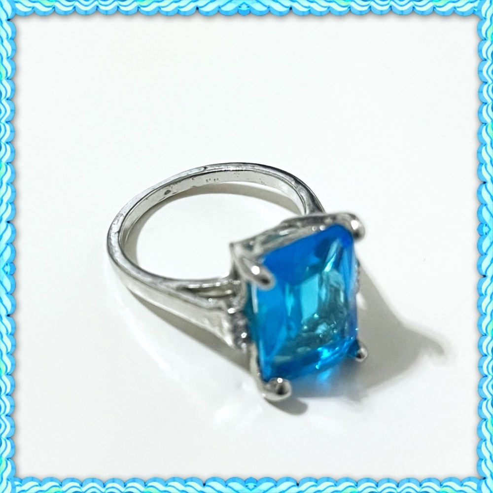 Ring with blue stone